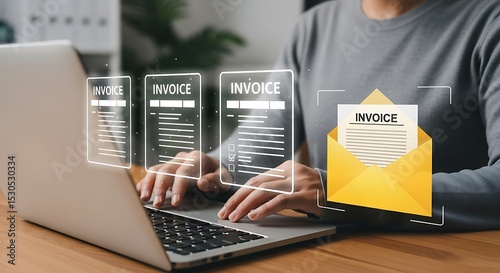 Sending an invoice via email concept using a laptop computer
