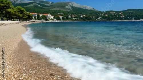 Animation of sea surging clear water on a pebble beach