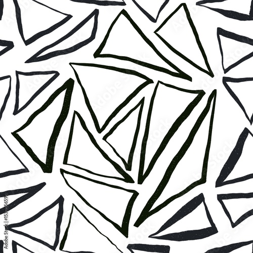 Seamless geometric pattern with hand drawn triangles. Black and white background.
