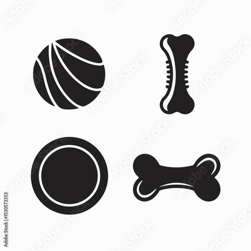 Playful set of black and white dog toys including a bone ball frisbee and other various accessories