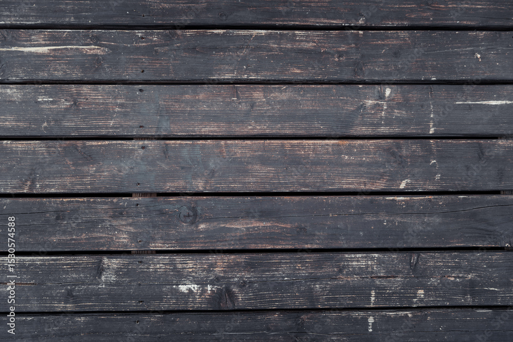 Obraz premium Aged wooden planks with rough texture and natural imperfections