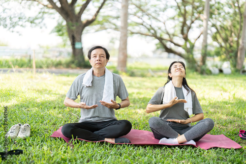 Couple Practicing Yoga Breathing Techniques Outdoors. Enhancing Well-Being.
