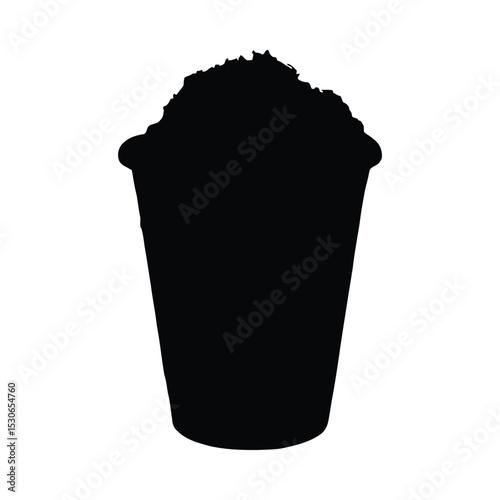 Iced coffee silhouette with whipped cream and caramel drizzle isolated on white background