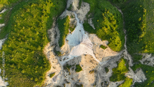 Buzău's Boiling Mud Volcanoes. 
This photo provides a glimpse into this extraordinary geological phenomenon, where the Earth seems to be constantly in motion.