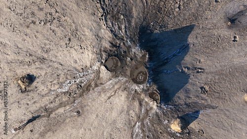 Buzău's Boiling Mud Volcanoes. 
This photo provides a glimpse into this extraordinary geological phenomenon, where the Earth seems to be constantly in motion.
