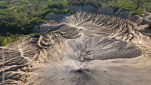 Buzău's Boiling Mud Volcanoes. 
This photo provides a glimpse into this extraordinary geological phenomenon, where the Earth seems to be constantly in motion.