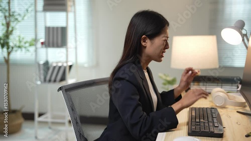 Businesswoman getting stressed while working on computer