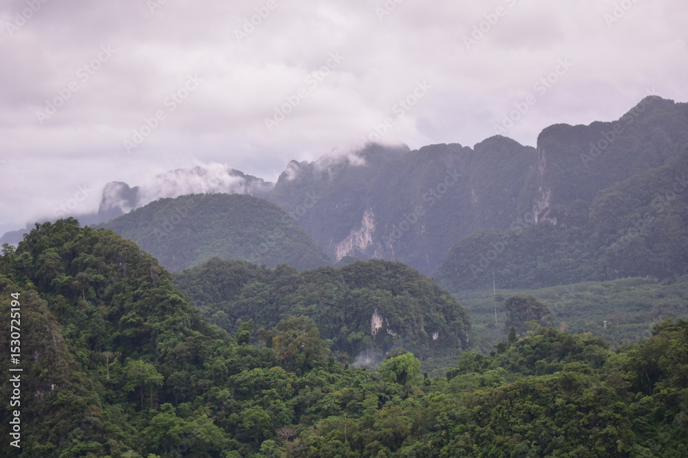 Obraz premium cloudy calcareous mountains, Green mountains and clouds, mist clouds after rain