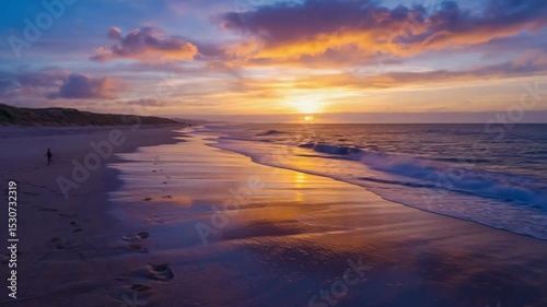 Scenic Beach Sunrise with Waves and Colorful Sky