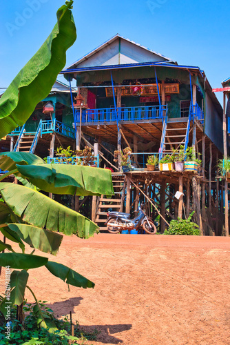 Wallpaper Mural SIEM REAP, CAMBODIA - APRIL 28, 2022: KAMPONG PHLUK FLOATING VILLAGE during the dry season on a hot sunny day. Post covid-19 pandemic landscape. Torontodigital.ca