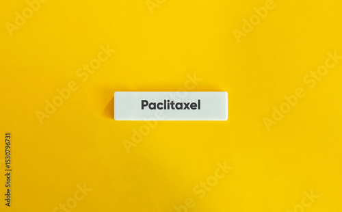 Paclitaxel Word on Minimal Letter Tile with Yellow Background photo