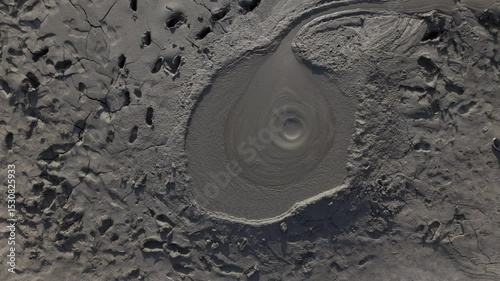 Buzău's Boiling Mud Volcanoes.
This aerial video captures a surreal landscape in Buzău County, Romania, showcasing the unique and otherworldly Muddy Volcanoes. 