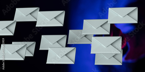 Abstract image of numerous grey envelopes, seemingly floating against a vibrant blue and purple backdrop. photo