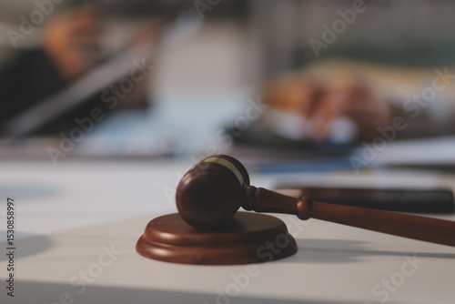 Consultation and conference of lawyers and professional businessman working and discussion having at law firm in office. Concepts of law, Judge gavel with scales of justice.