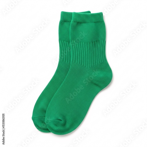 A pair of vibrant green athletic socks, neatly folded and showcasing a ribbed texture