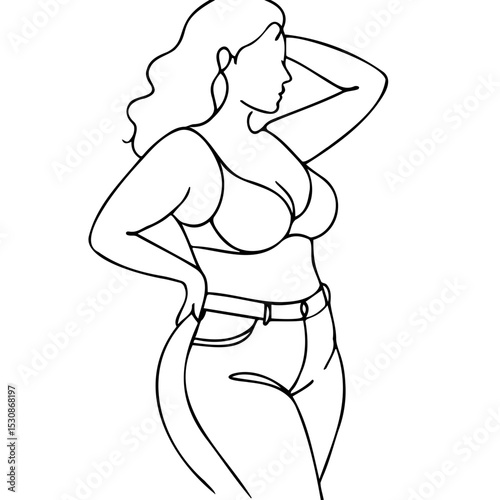 Curvy woman posing in a bra and jeans with long hair  