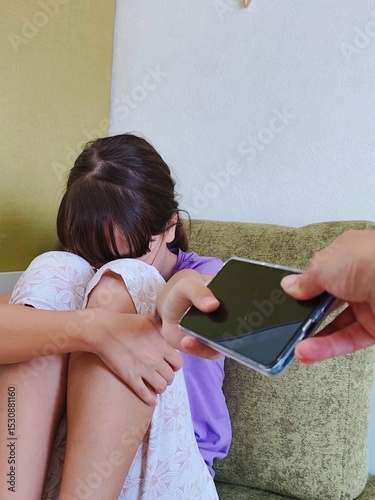 mom prohibiting teenage daughter to use cellphone