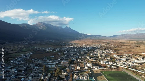 Soar above Baisha Ancient Town and witness its timeless beauty from the sky. Traditional rooftops stretch across the valley. Mountains embrace the horizon. A hidden gem waiting to be explored by curio
