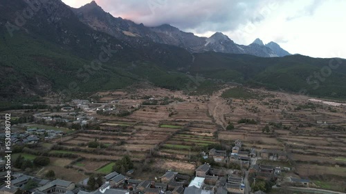 Soar above Baisha Ancient Town and witness its timeless beauty from the sky. Traditional rooftops stretch across the valley. Mountains embrace the horizon. A hidden gem waiting to be explored by curio
