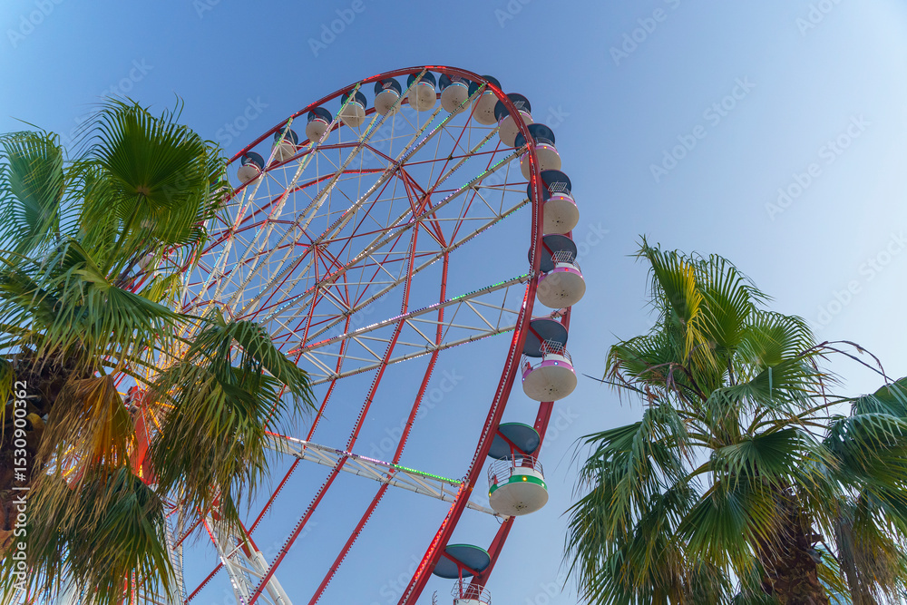 Fototapeta premium Ferris Wheel park Against the Sky Background