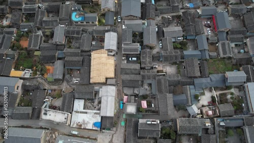 Soar above Baisha Ancient Town and witness its timeless beauty from the sky. Traditional rooftops stretch across the valley. Mountains embrace the horizon. A hidden gem waiting to be explored by curio