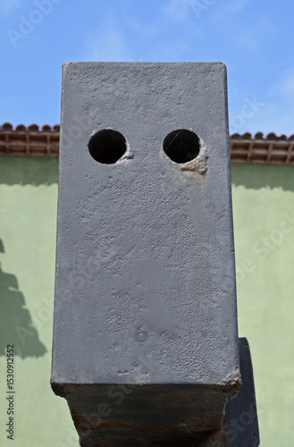 Close Up of End of Steel Beam with Drilled Holes 