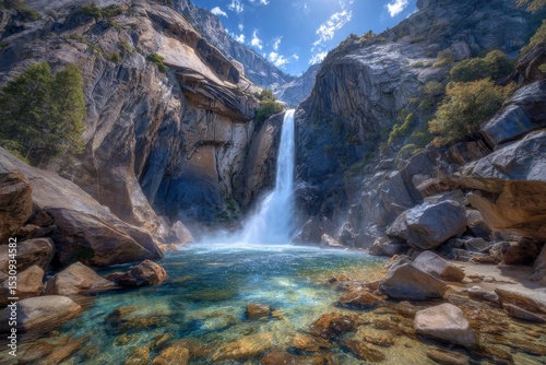 Yosemite National Park's Yosemite Falls viewed closeup under a blue sky