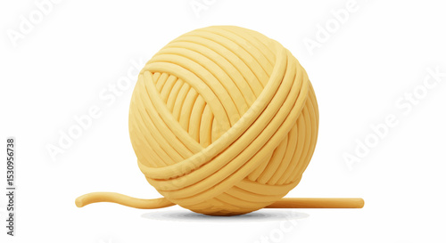 A close-up shot of a soft yellow ball of yarn.