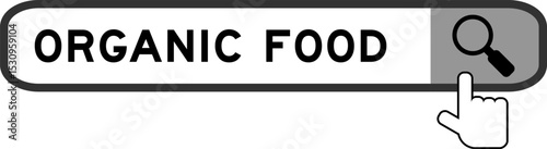Search banner in word organic food with hand over magnifier icon on white background