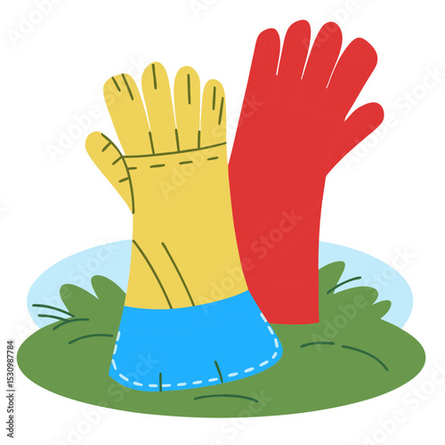 Colorful gardening gloves displayed on the grass for Labor Day  