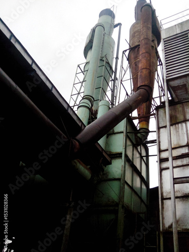 Decommissioned wood ply manufacturing plant, Industrial machineries and tools of Old Factory Facility, Rusty large industrial facilities