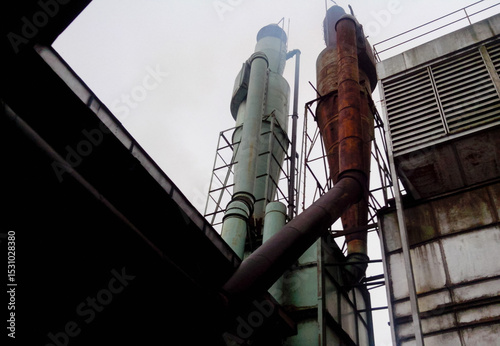 Decommissioned wood ply manufacturing plant, Industrial machineries and tools of Old Factory Facility, Rusty large industrial facilities