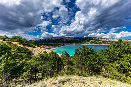 Fototapeta Naklejka Na Ścianę i Meble -  Hiking trail leading from the beach in Baska to the Bag mountain, city panorama seen from above,