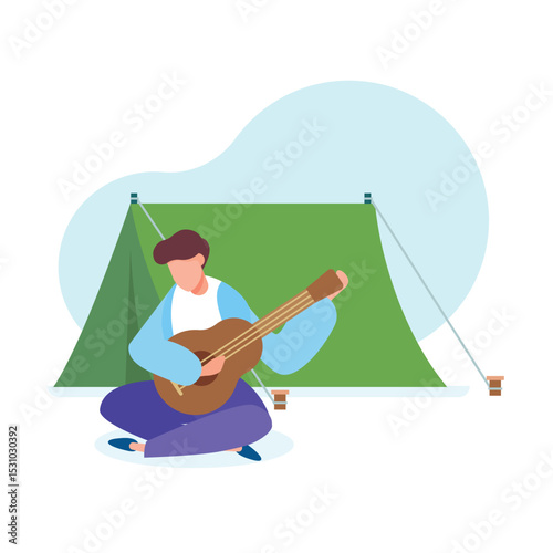 Man plays guitar outdoors while camping in front of a green tent