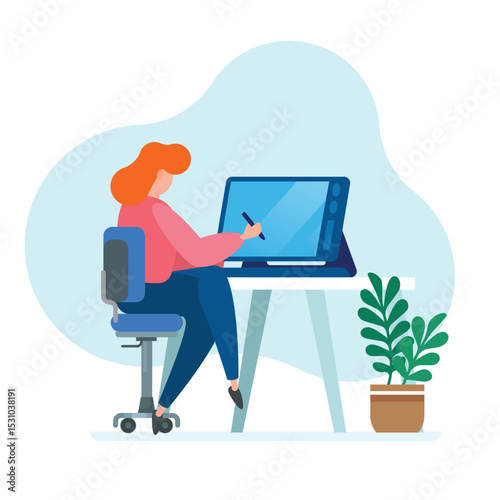 Woman working at her desk using a digital tablet and stylus at home office