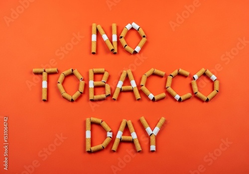 Saying NO to Tobacco a message for a healthier future on orange with cigarettes arranged to form