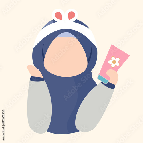 Muslim women's skin care routine - holding a facial cleanser