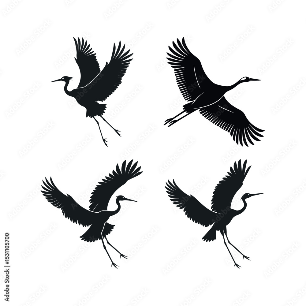 Obraz premium Four black silhouettes of cranes in flight
