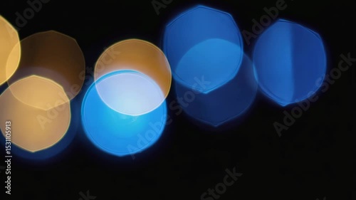 background of abstract glitter lights. blue, gold and black. de focused. motion video.