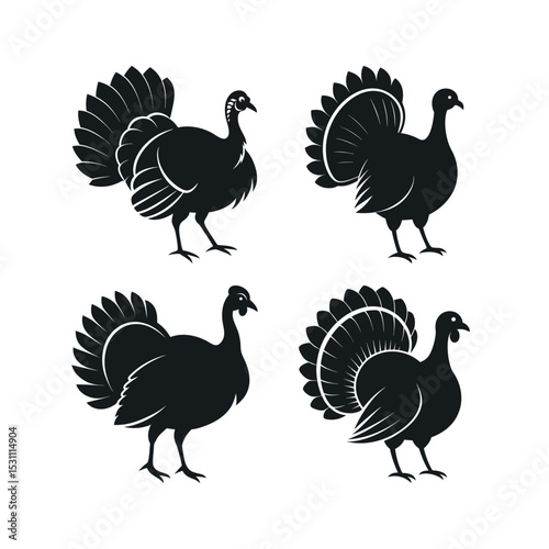 Four black silhouettes of turkeys in different poses