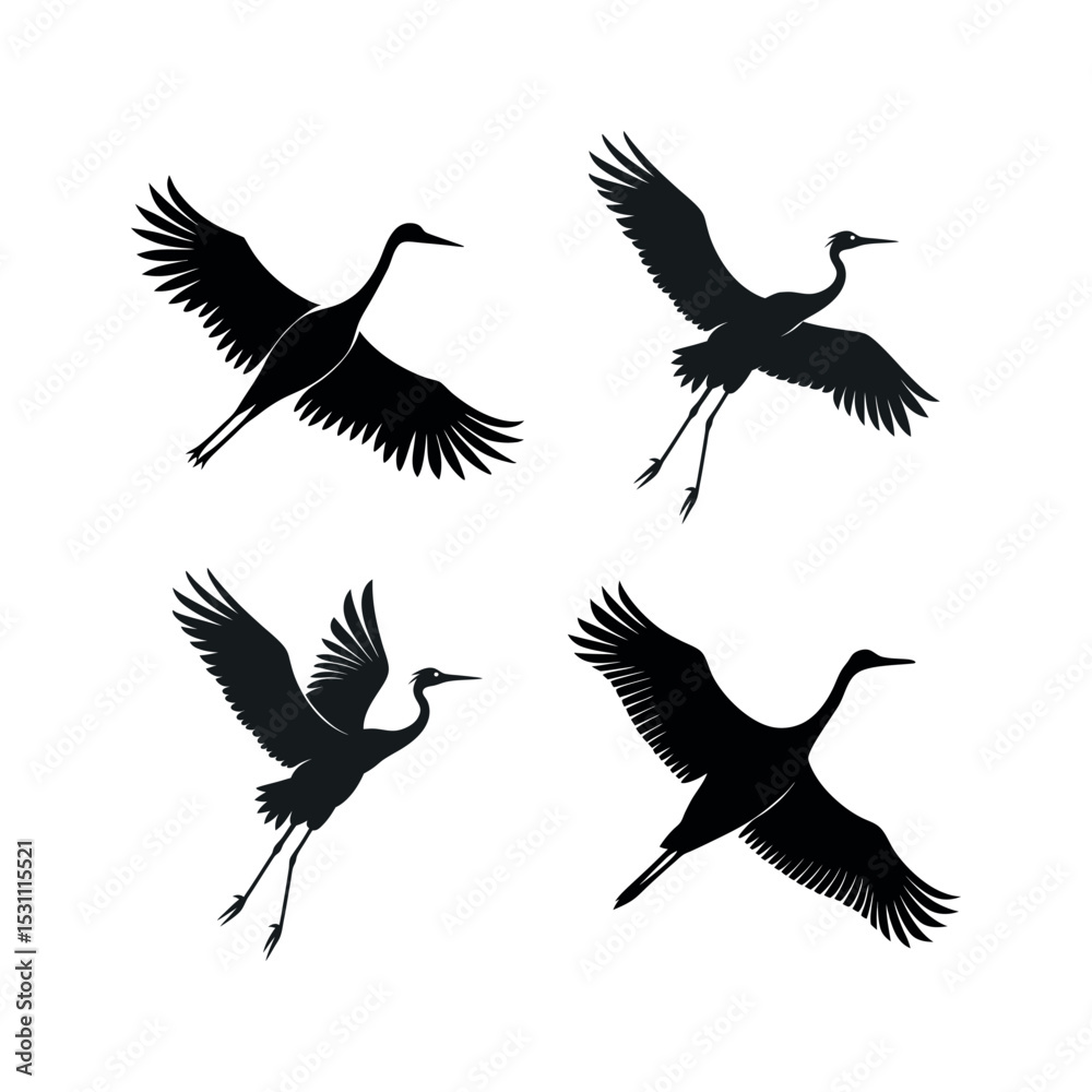 Obraz premium Four elegant black silhouettes of cranes in flight