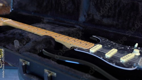 Discovering the joy of learning guitar in a cozy living room setting