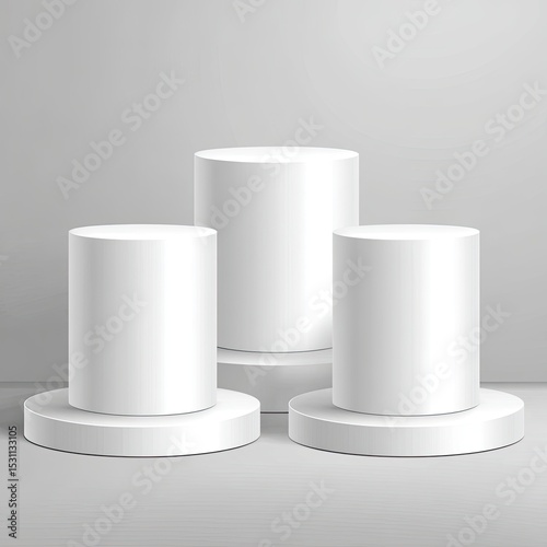 Three white cylindrical podiums on a light gray background