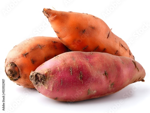 fresh sweet potatoes displayed with detail on a white background photo