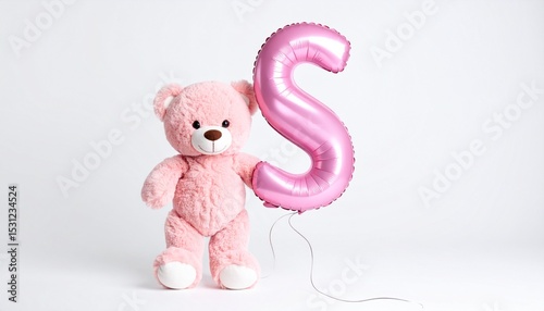 Cute pink teddy bear with balloon letter S. Baby name reveal after child birth. Stuffed animal isolated on white background