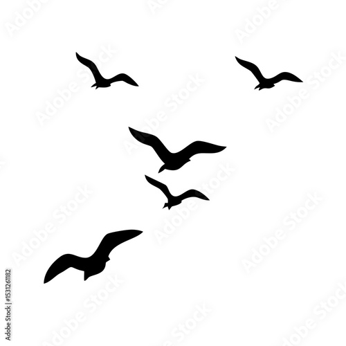 Silhouette of a flock of seagulls flying against a plain background.



