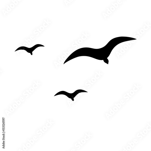 Silhouette of a flock of seagulls flying against a plain background.



