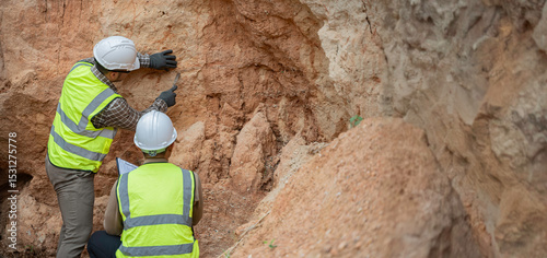 Fotografija Geologist surveying mine,Explorers collect soil samples to look for minerals, A