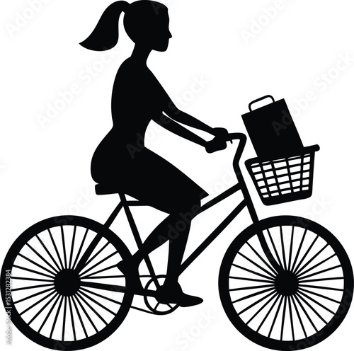 silhouette of a woman riding a bicycle