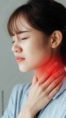Woman Holding Neck With Throat Pain